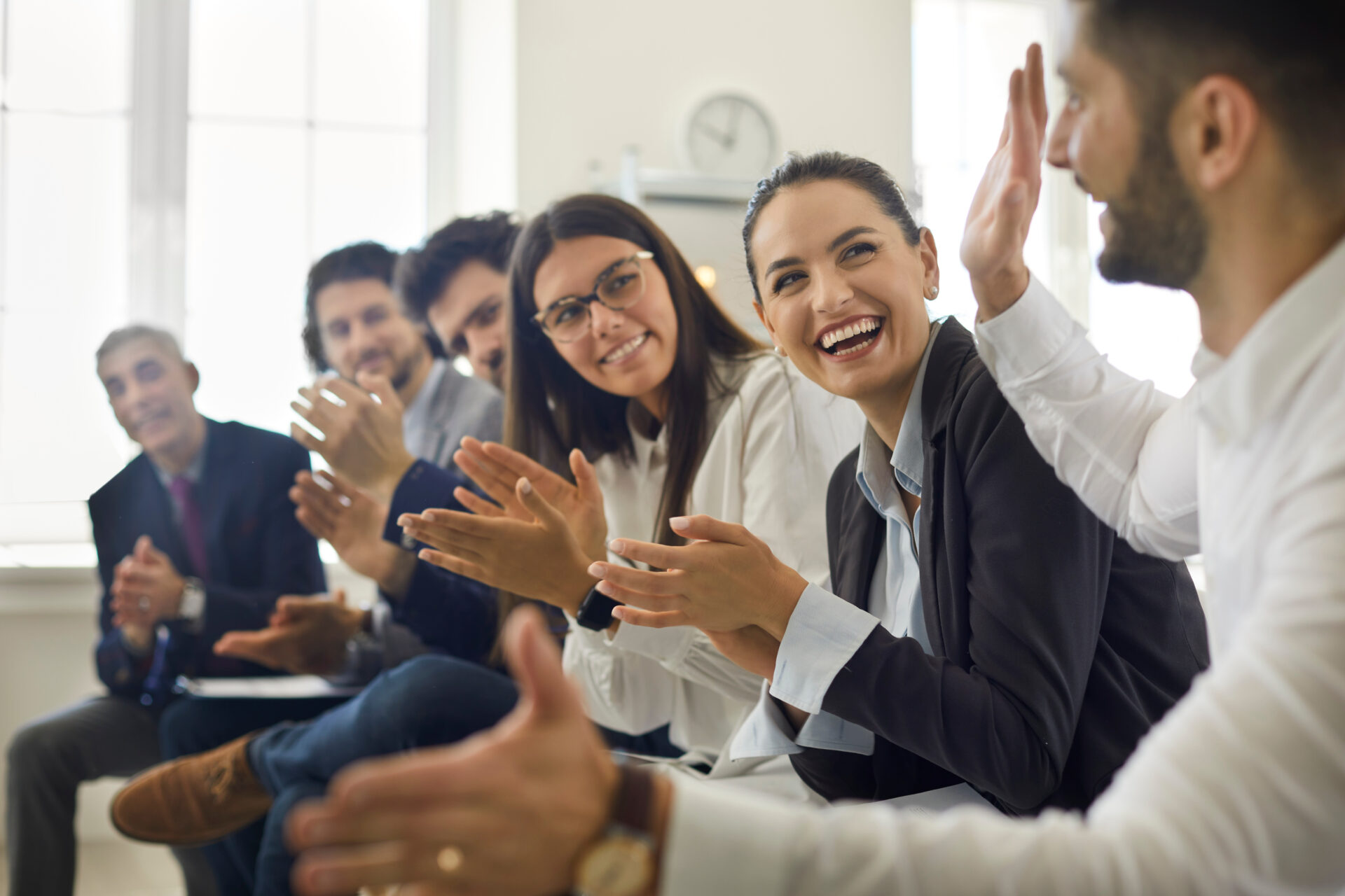 AdobeStock_441951989 - laughing in meeting